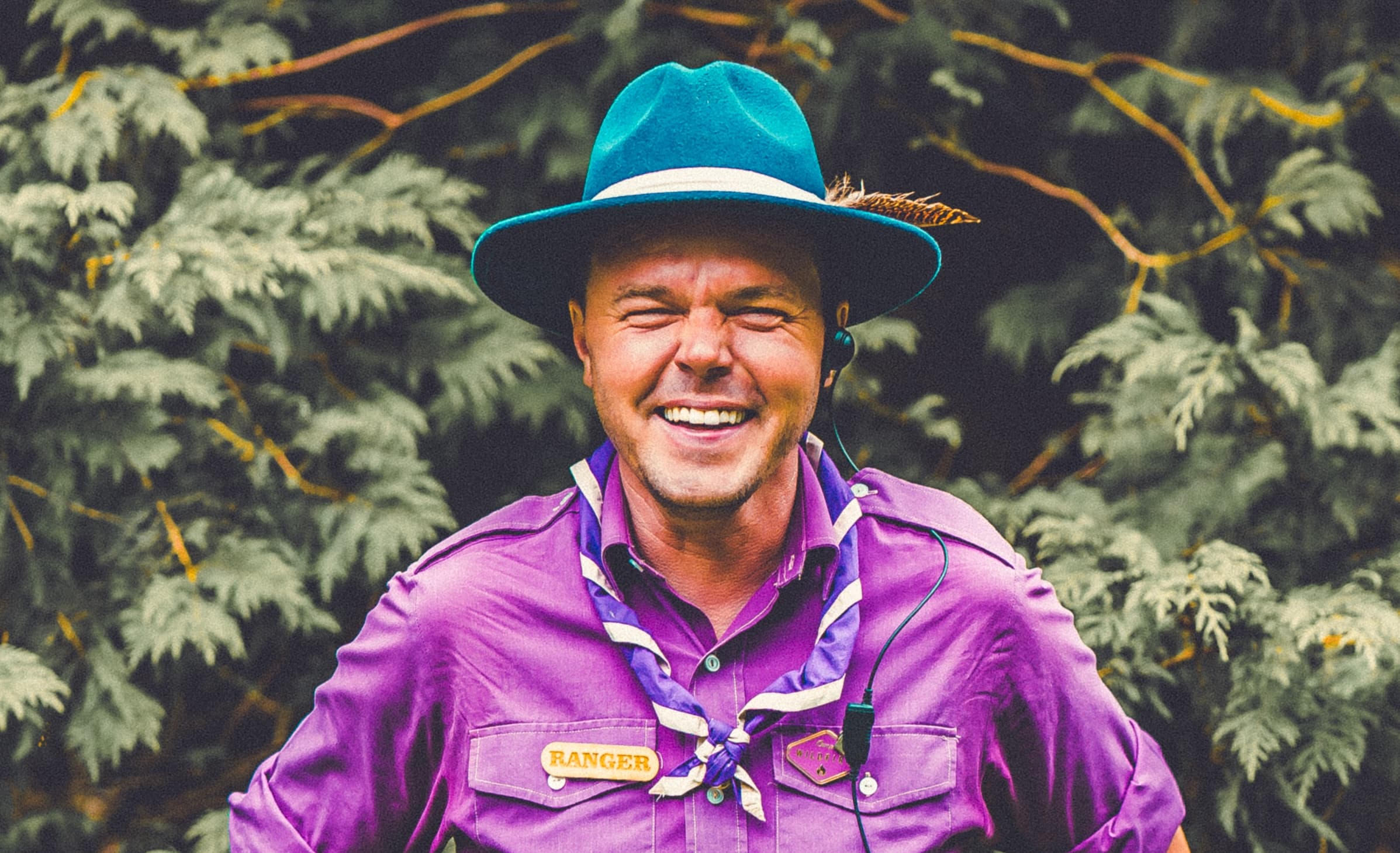 Smiling man in a ranger outfit